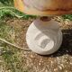 Vintage antique lamp with a stone base.