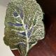 Vintage ceramic leaf-shaped vide poche, signed.