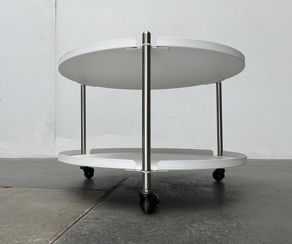 Minimalist Thrill metal coffee table or side table with wheels by Leitmotiv.