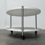 Minimalist Thrill metal coffee table or side table with wheels by Leitmotiv.