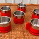 6 red cups and saucers from the Italian brand 'Morinos'.