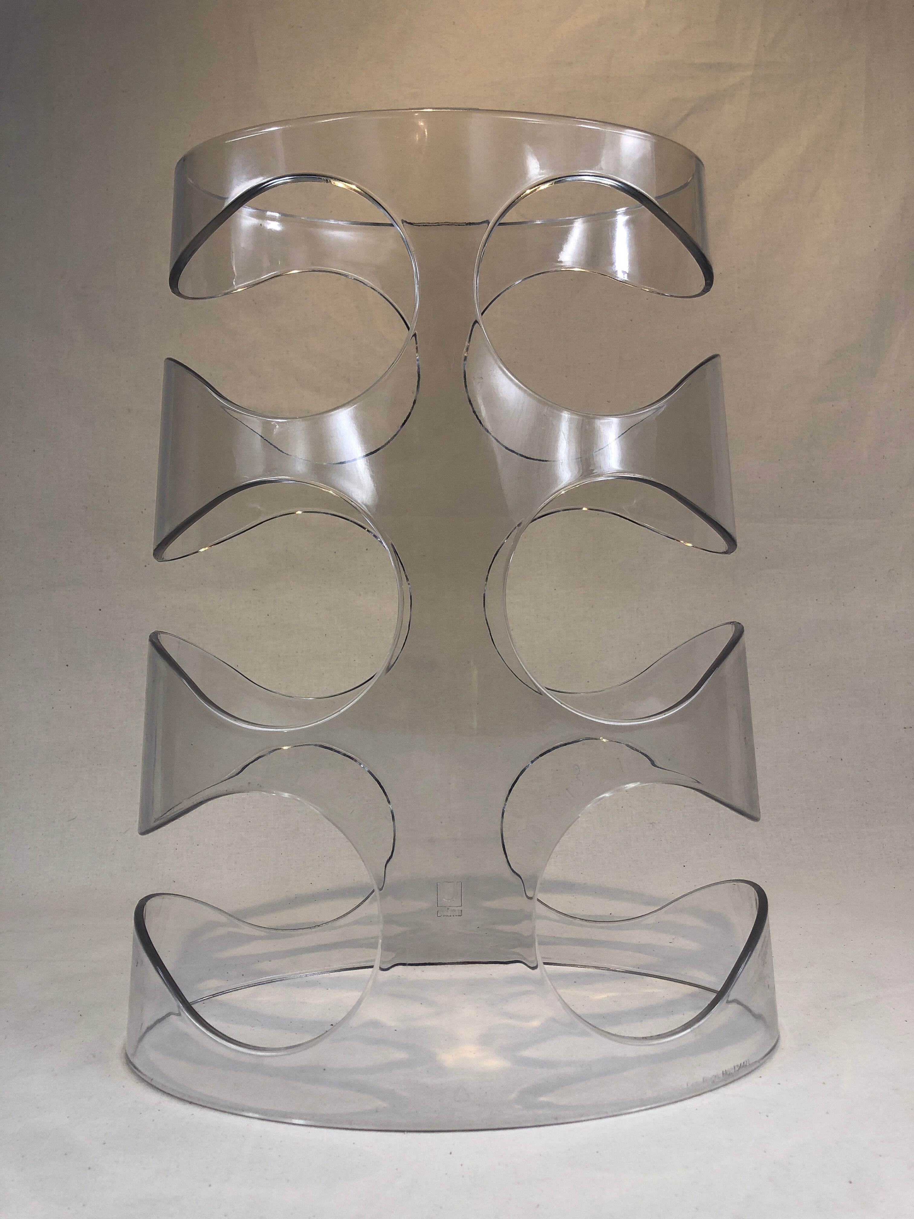 Transparent plexiglass bottle holder Umbra design Ran Lerner