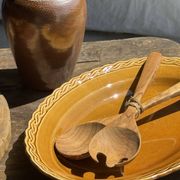 Antique oval dish, yellow-orange, frieze border L:24