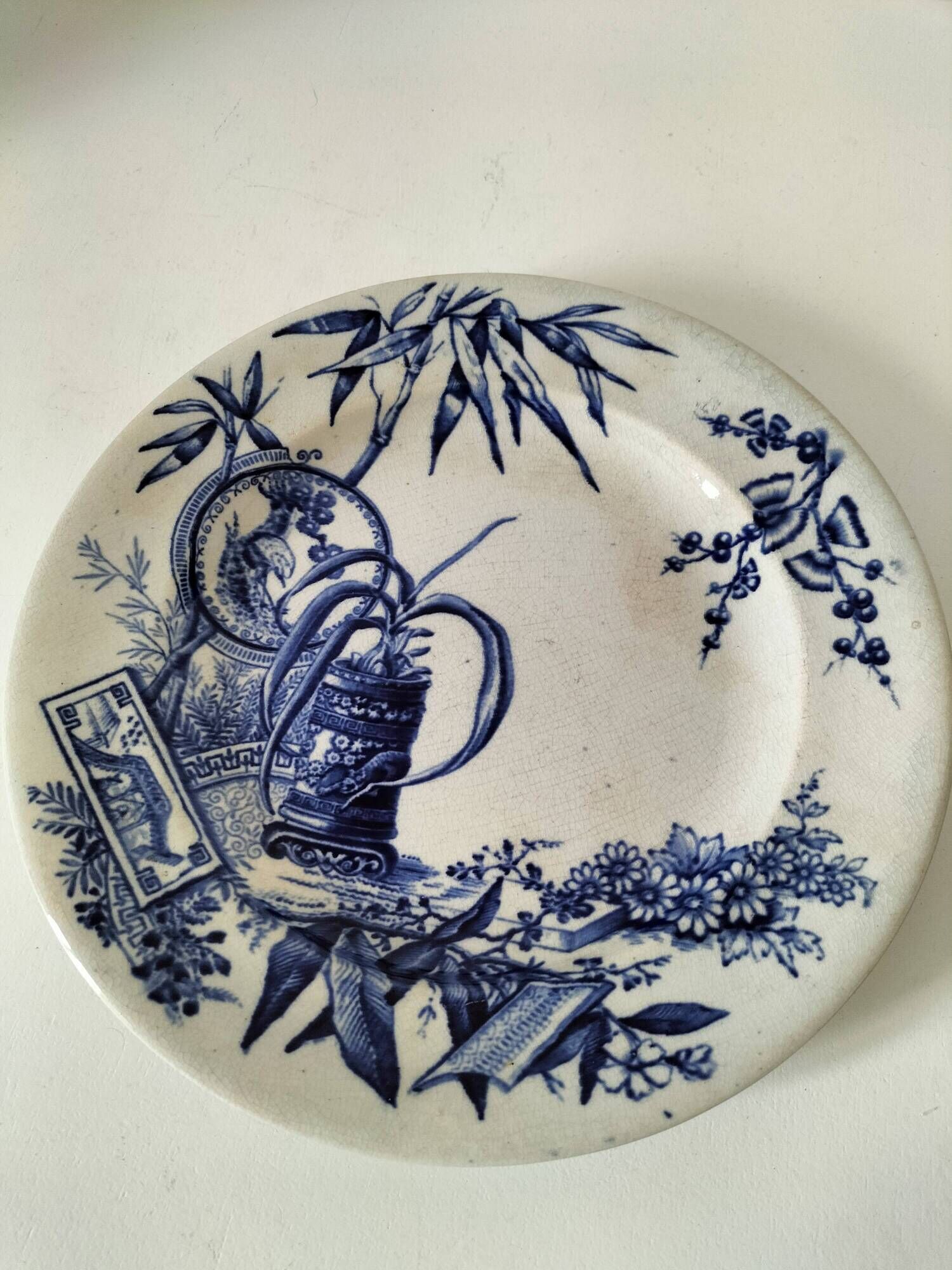 Antique plate with Chinese blue oriental decoration from the late 19th century.