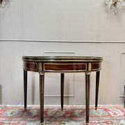 Half-moon table in mahogany from the Louis XVI period, 18th century.