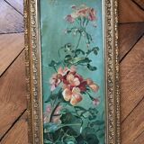 Two old paintings of flowers and gilded frames