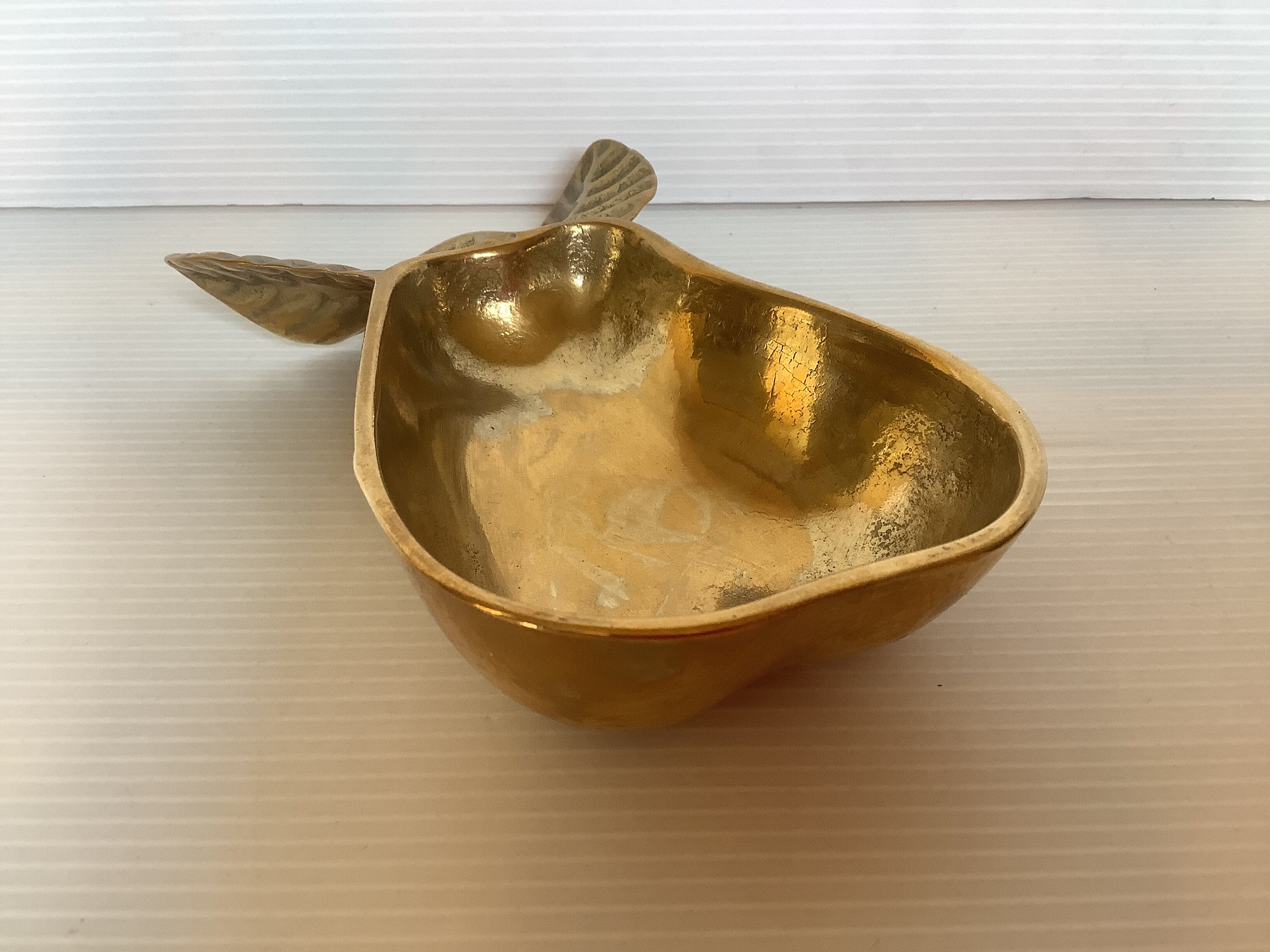 Empty pocket pear fruit brass