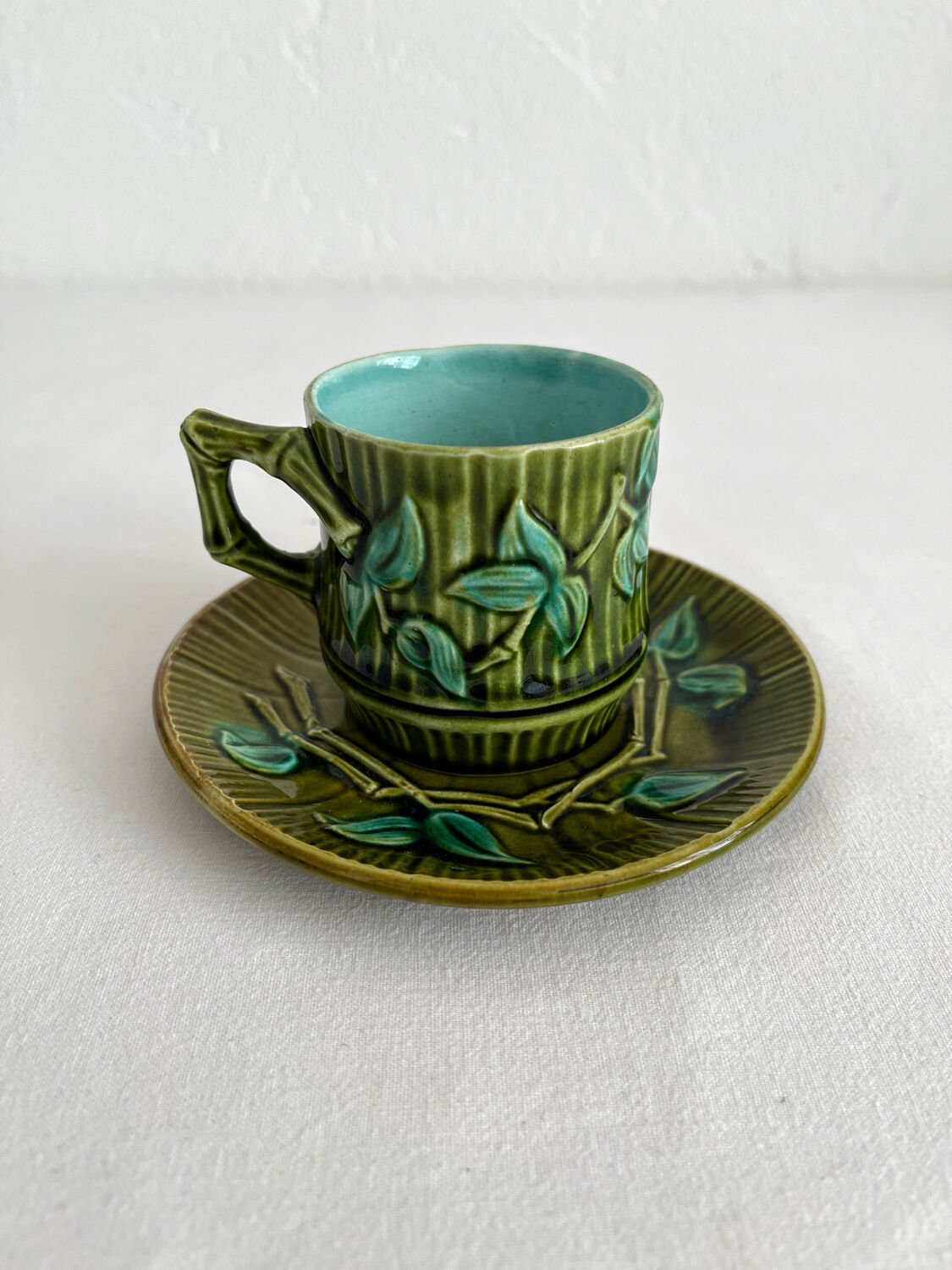 Antique earthenware coffee cup in bamboo slip