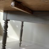 Round wooden table with flaps