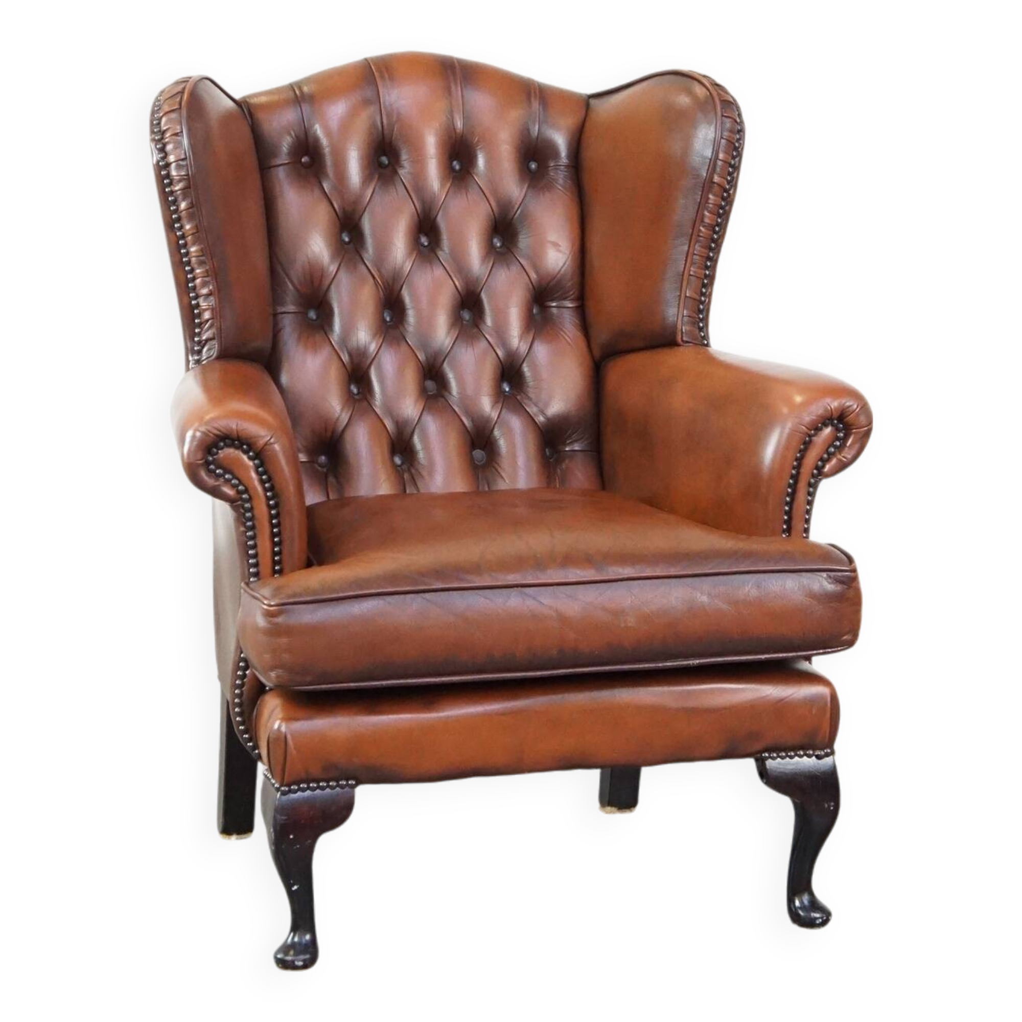 Brown leather wingback Chesterfield armchair