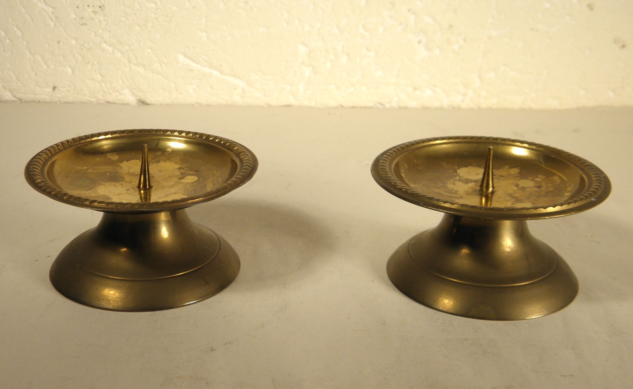 Pair of brass "pique - candle" candlesticks