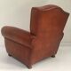 Large club chair in cognac leather