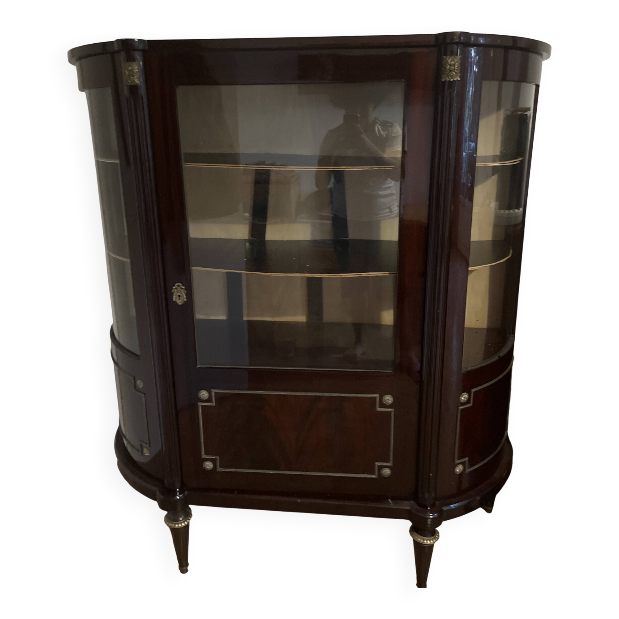 Curved display cabinet in Louis XVI style