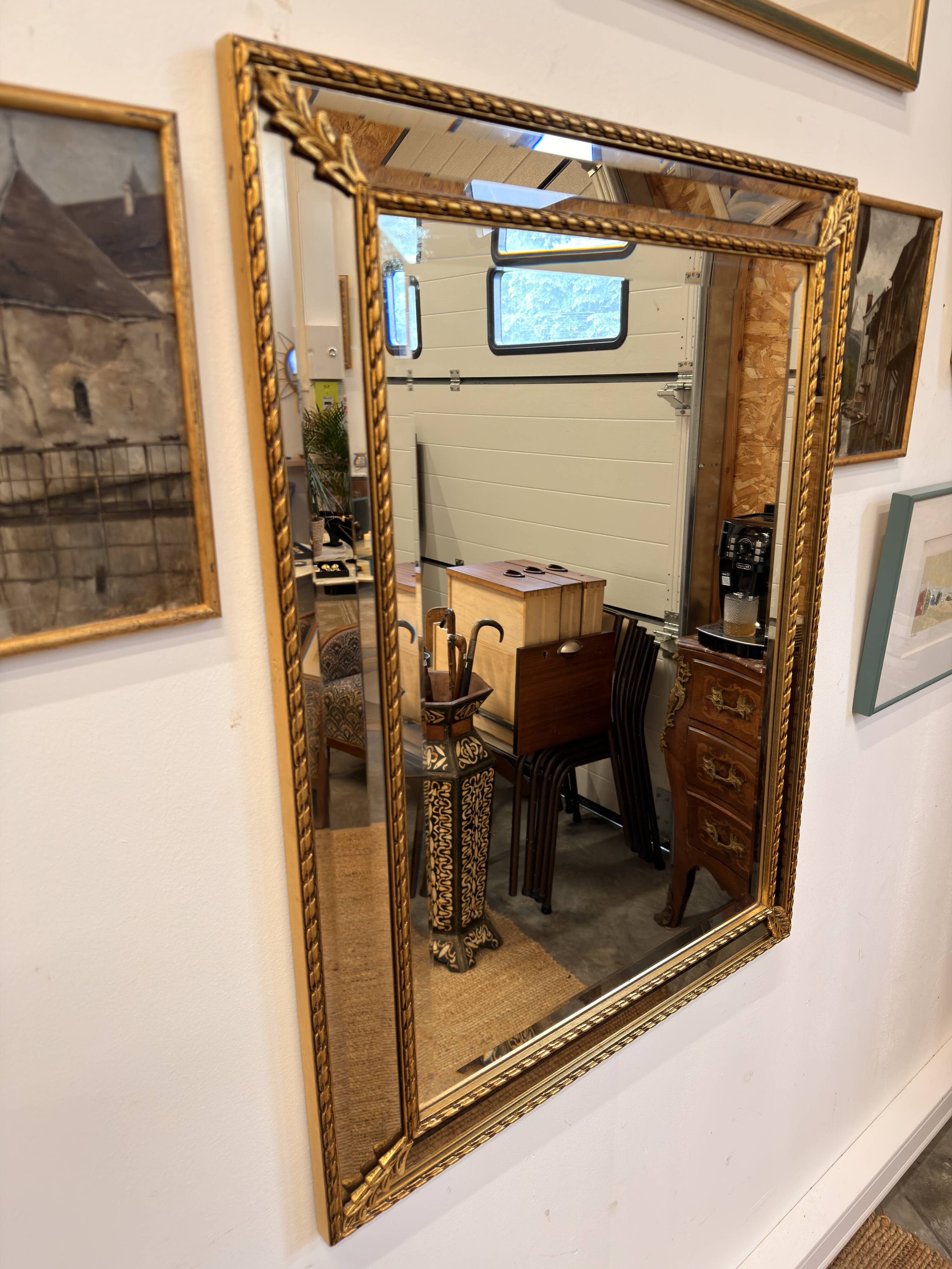 Miroir ancien biseauté doré style Louis XVI