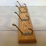 Wooden coat rack with four hooks