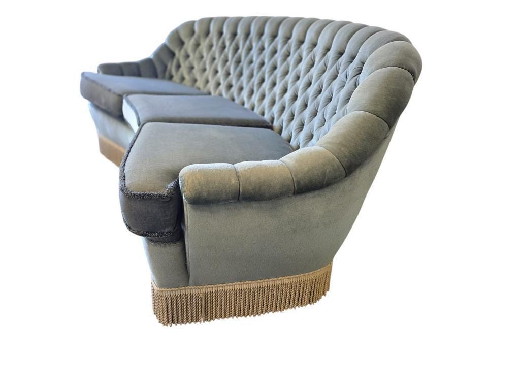 Light blue vintage sofa / armchair with fringes