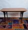 Vintage Scandinavian coffee table in teak and brass – 1960s