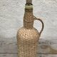 Bottle old woven wicker rattan