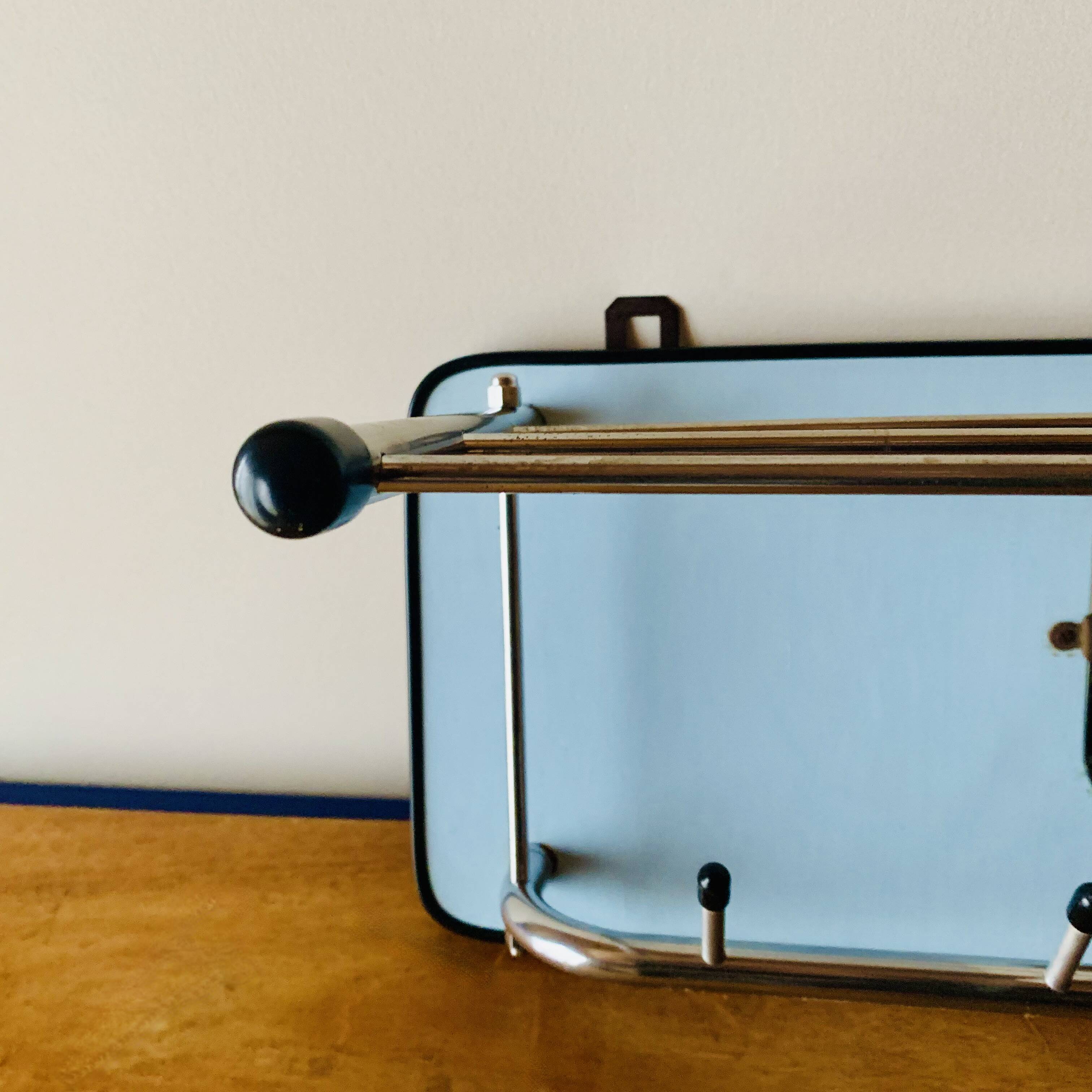 Vintage wall-mounted coat rack in wood and chrome metal with mirror