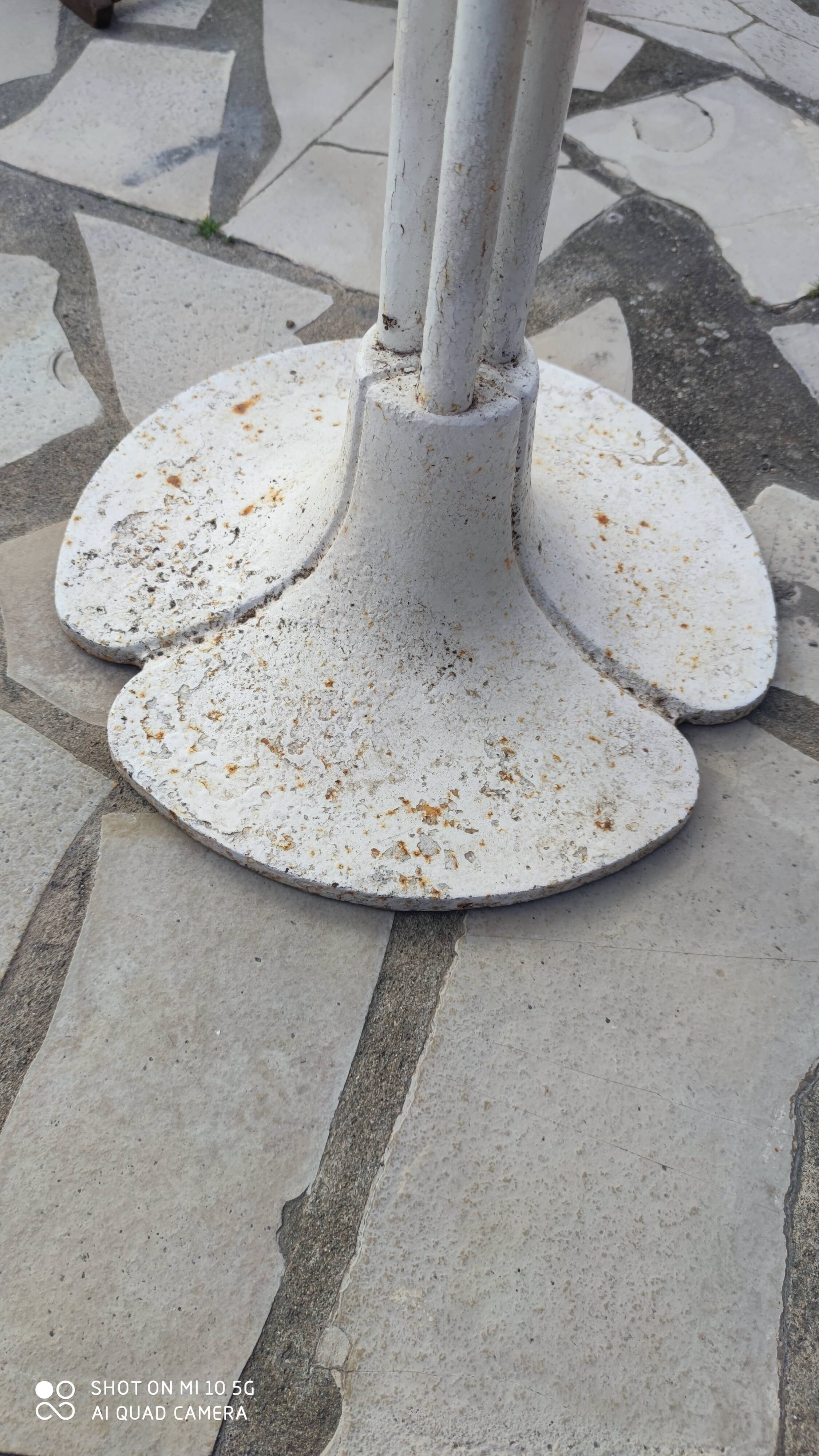 Garden or bistro table with steel and fiberglass base and top, circa 1970