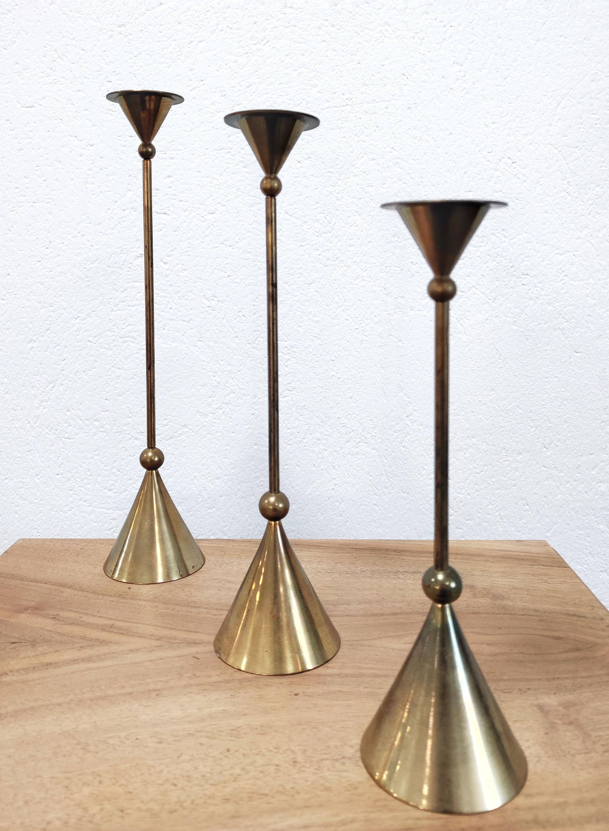 Set of three bronze candlesticks by Christian de Beaumont from the 1980s.