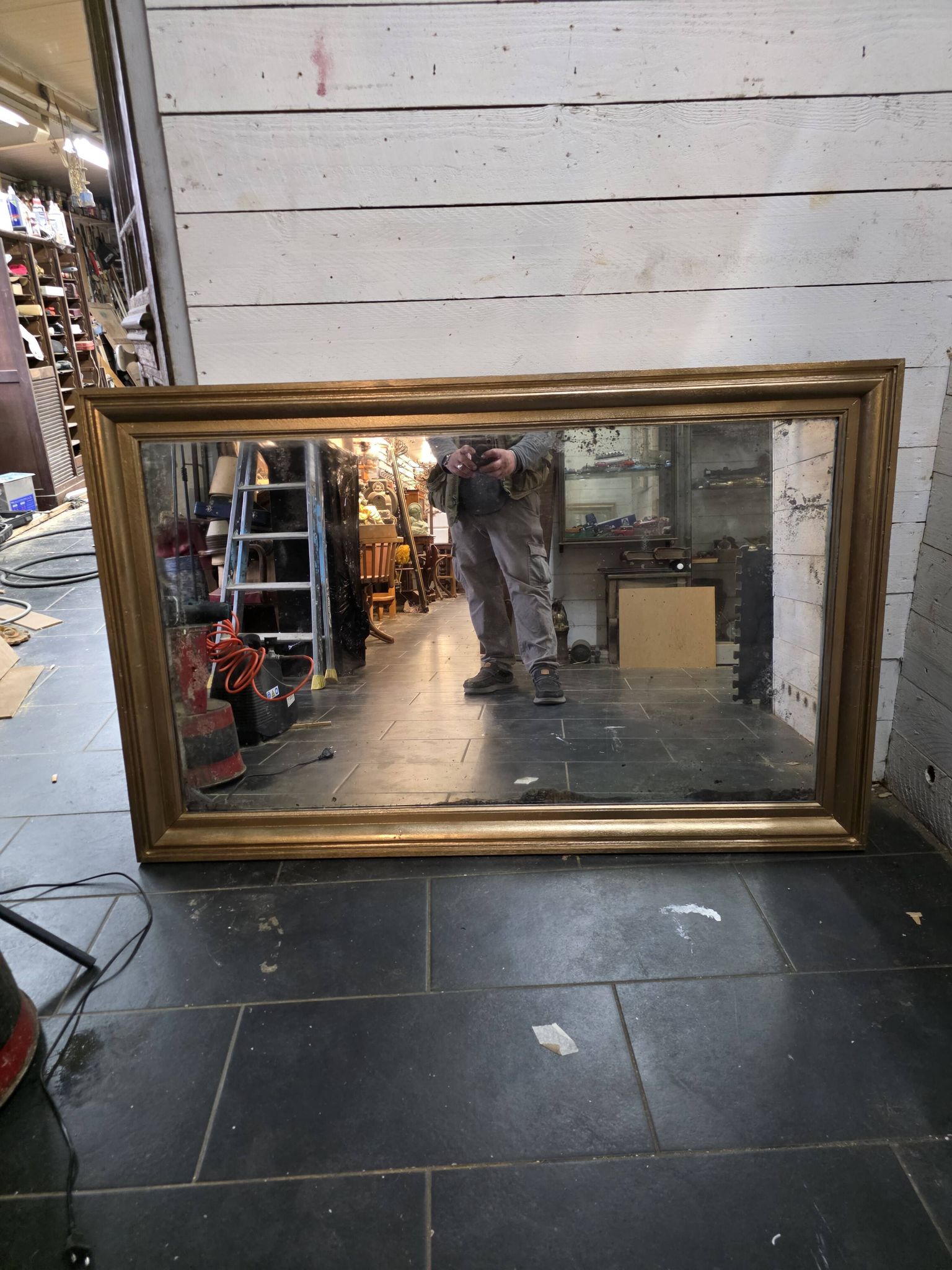 Golden mirror in oak from the 19th century.