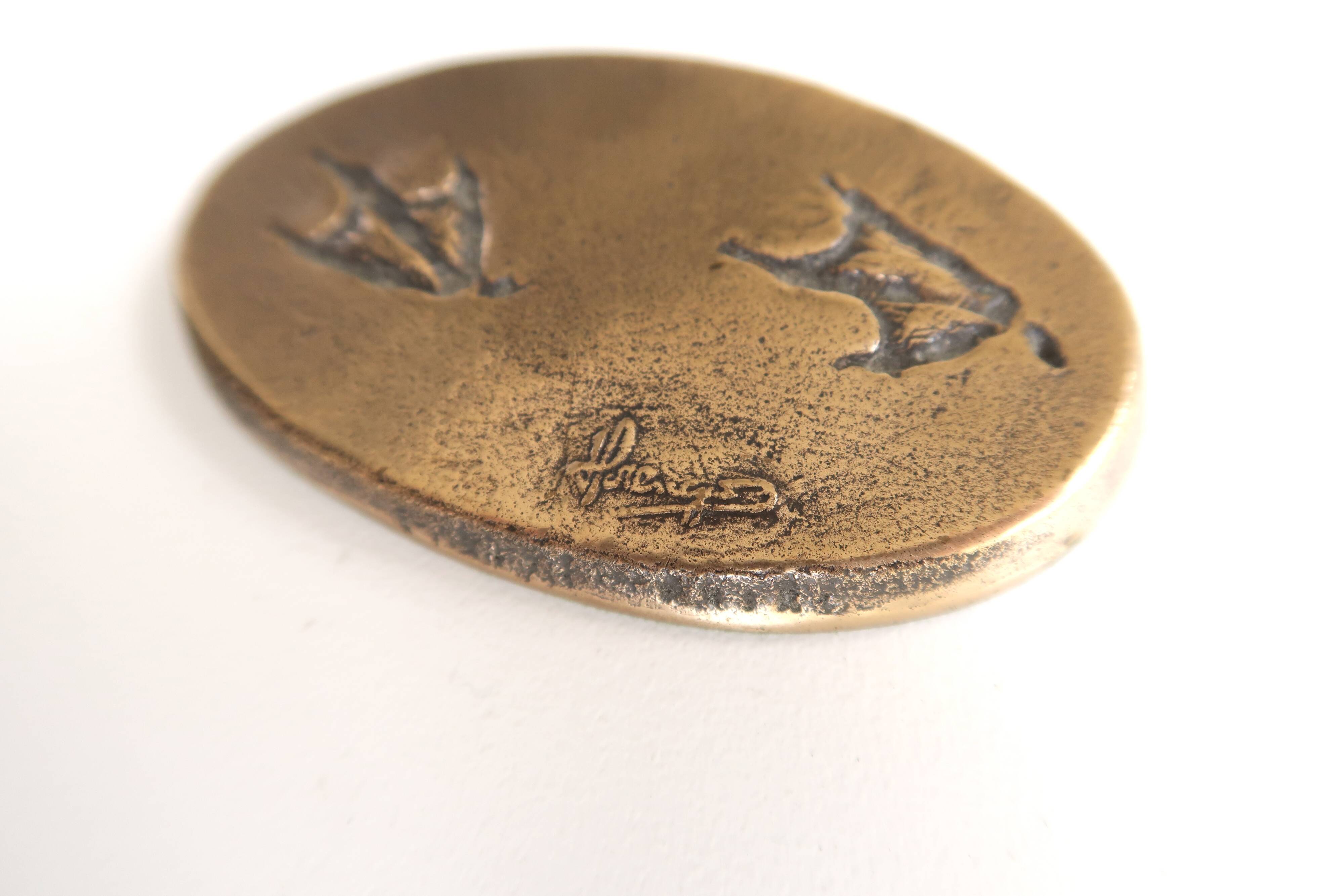 Signed bronze paperweight, 1993