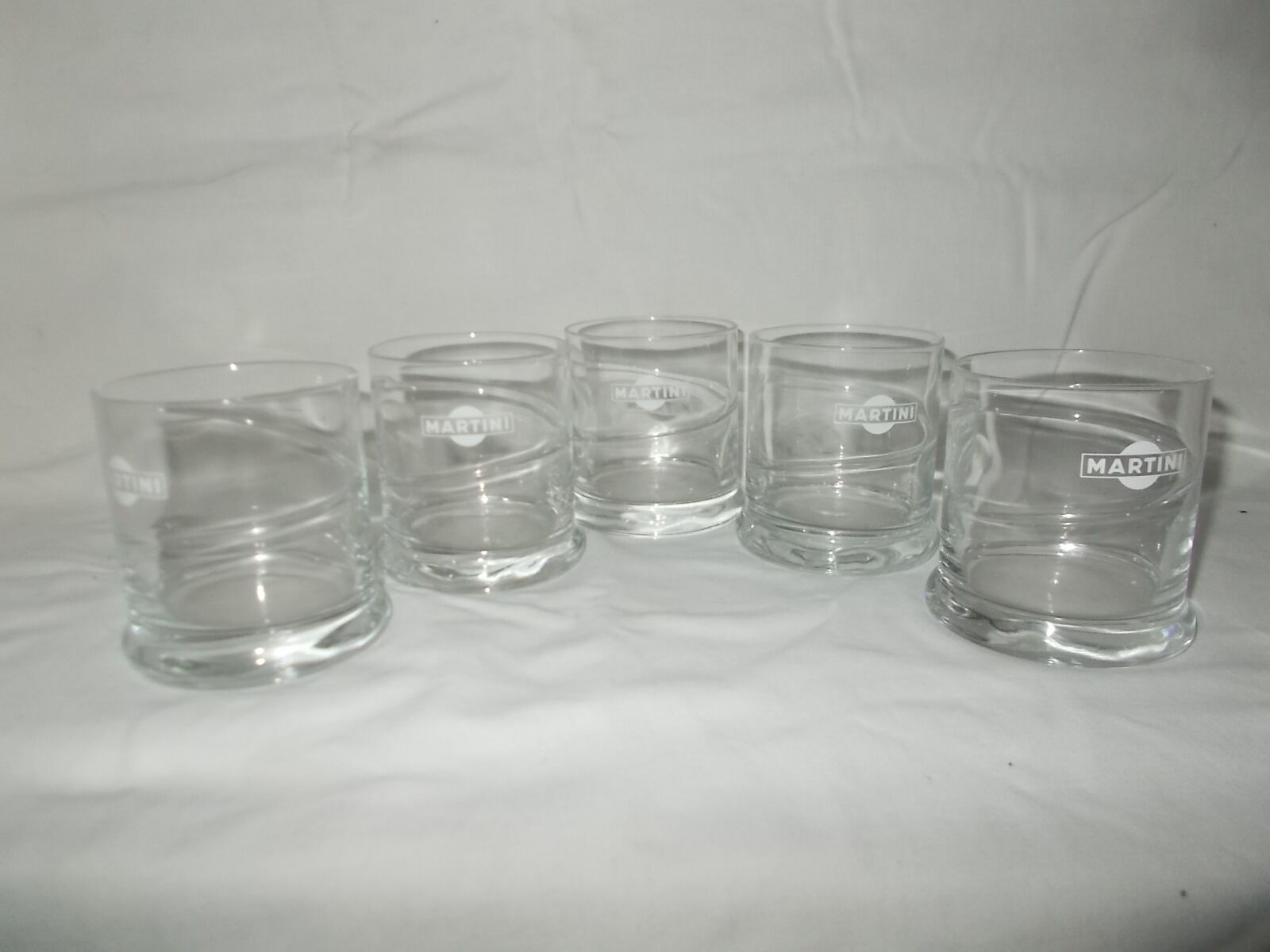 Lot of 5 bistro advertising martini glasses.