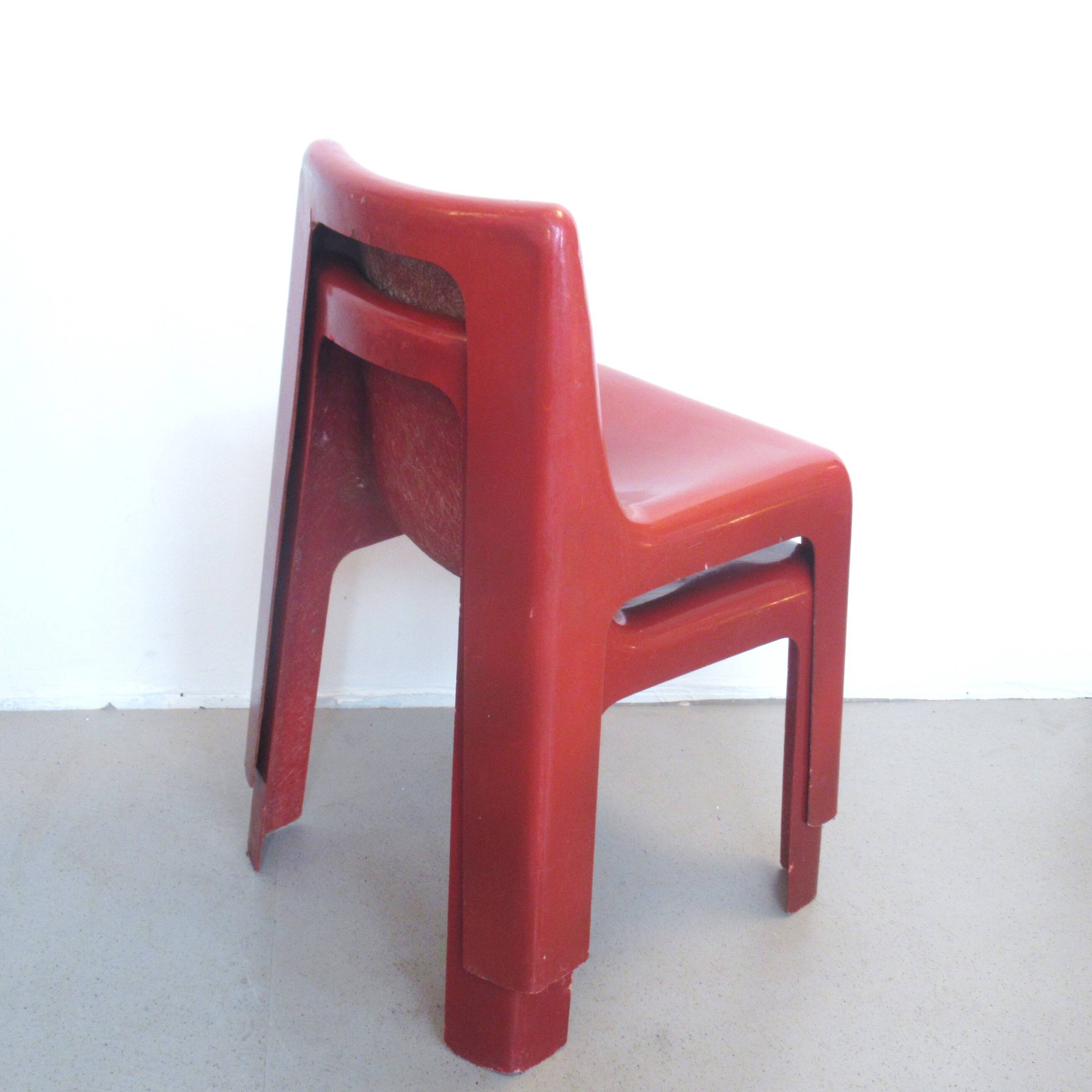 Pair of red fibreglass chairs from the 1970s.