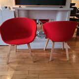 red canvas and wood armchair