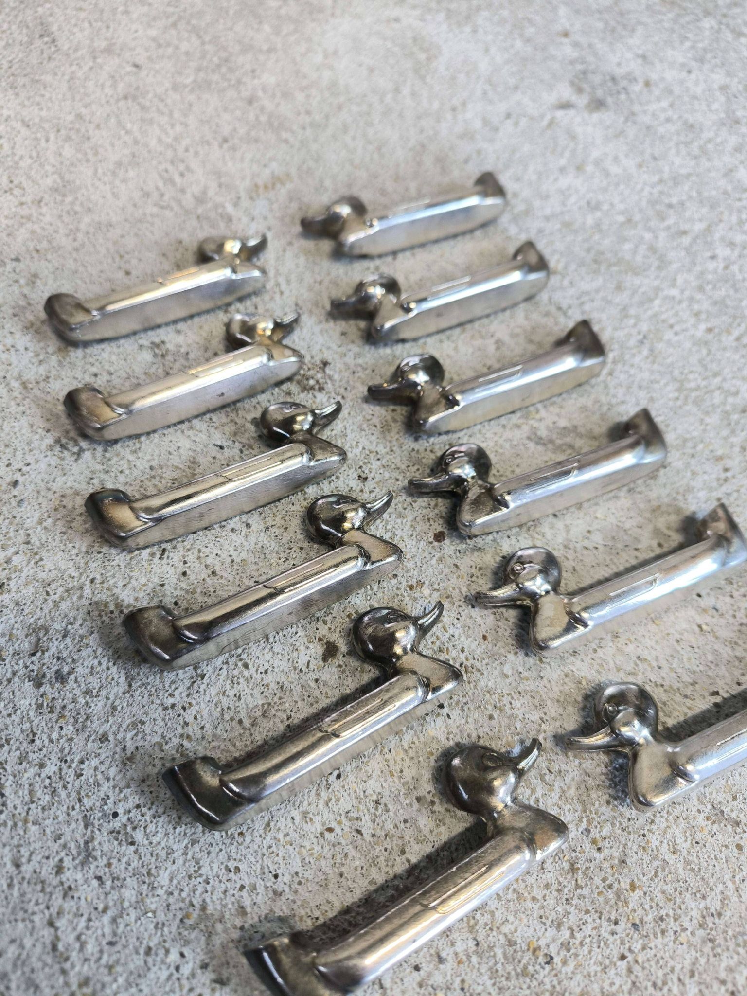 Set of 12 vintage knife rests, place card holders.
