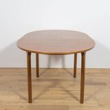 Mid-century extendable oval teak dining table from McIntosh, UK