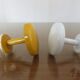 2 wall mounted coat racks in yellow and white metal 70s 80s