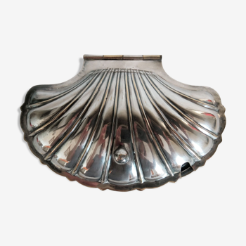 Silver metal shell to serve caviar, with crystal lining
