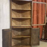 19th-century English corner cabinet in oak, mahogany, and fir.