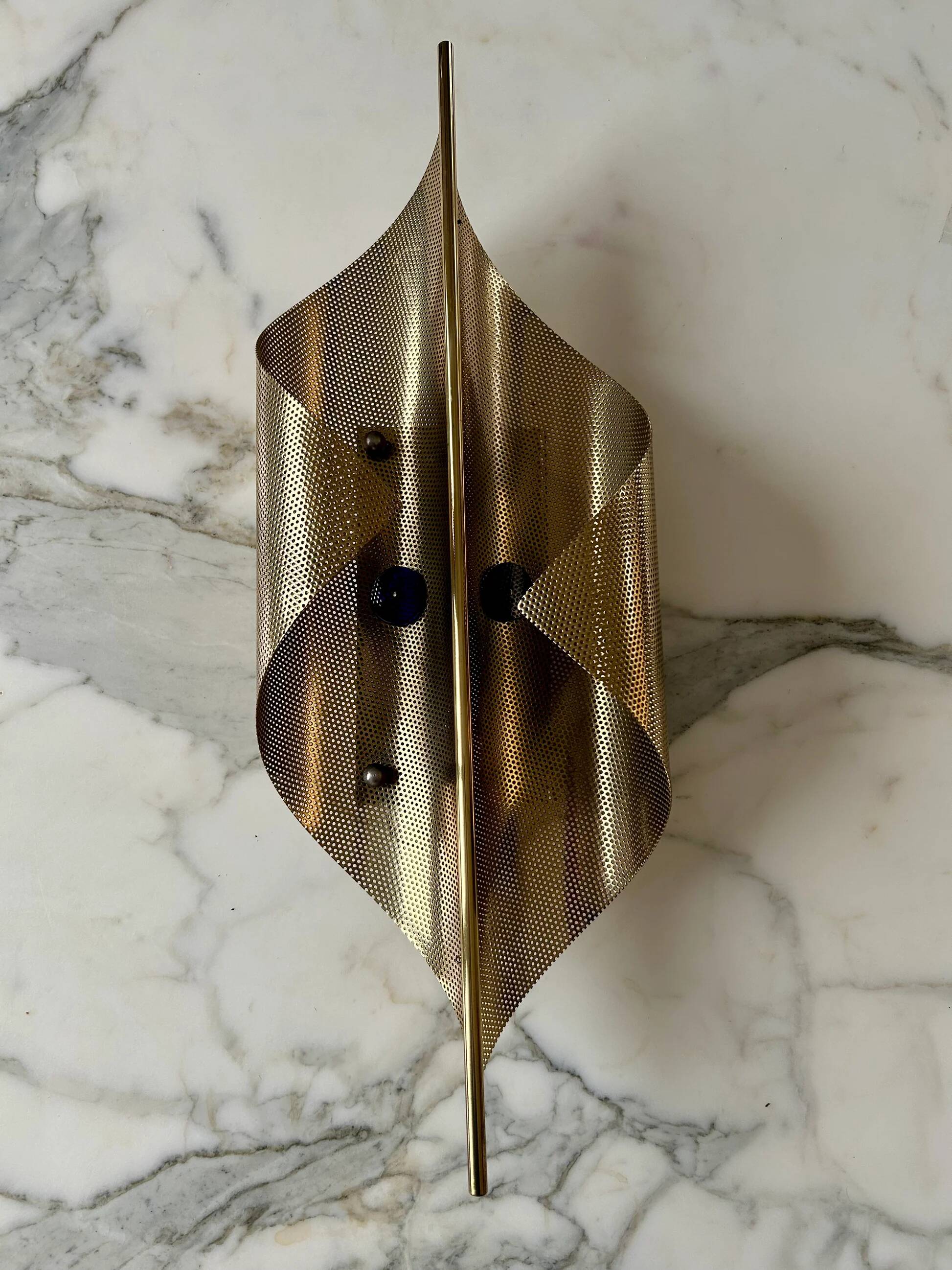 Pair of perforated brass wall lights by Christoph Palme, Germany, 1980s.