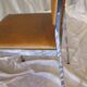 Pair of modernist chairs in chromed metal and imitation leather