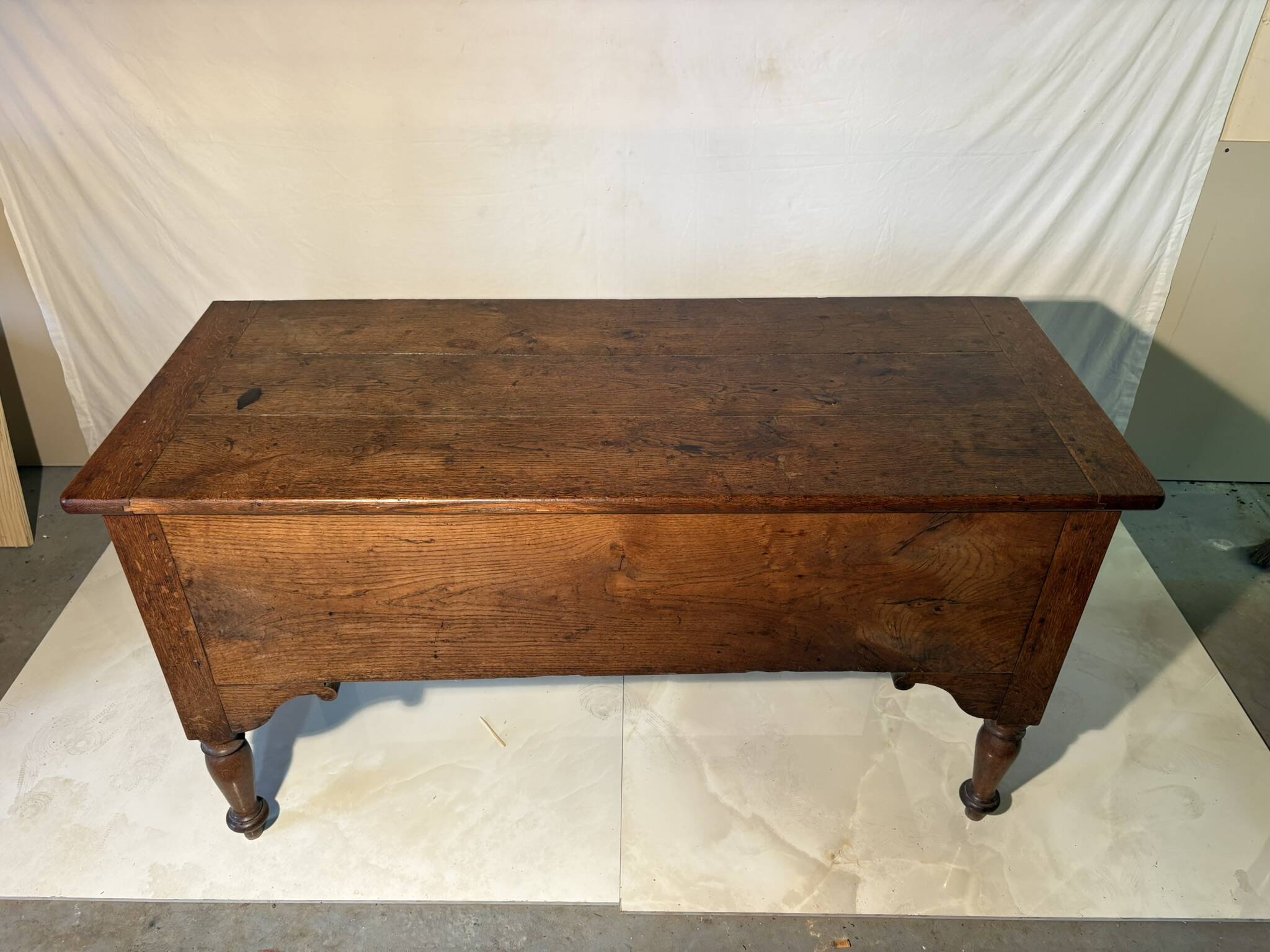 Large antique oak chest with turned legs