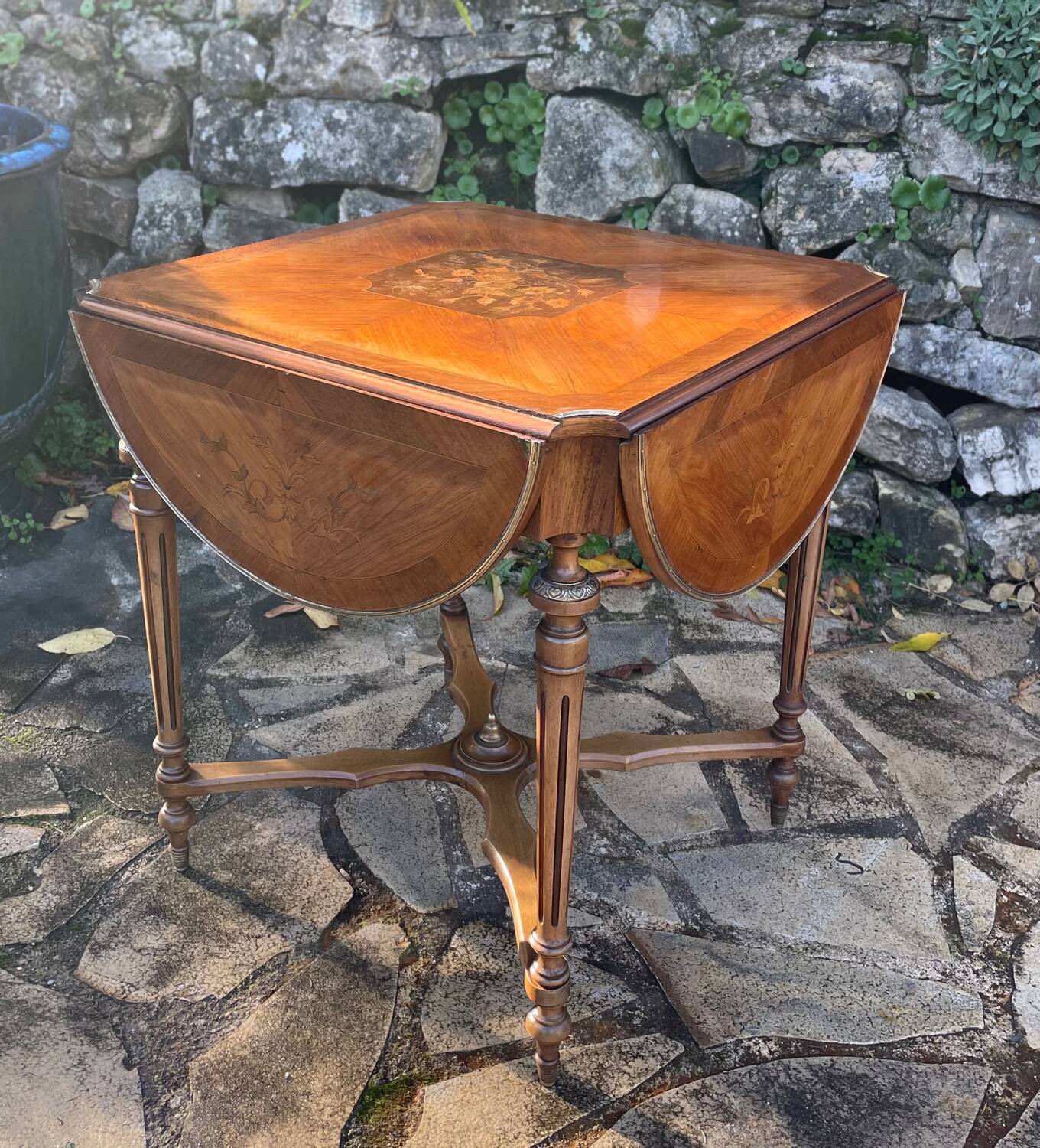 Center table decorated with marquetry of leaves and flowers in Louis XVI style, 19th century period