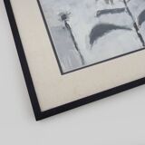 Framed painting with gray flower decor.