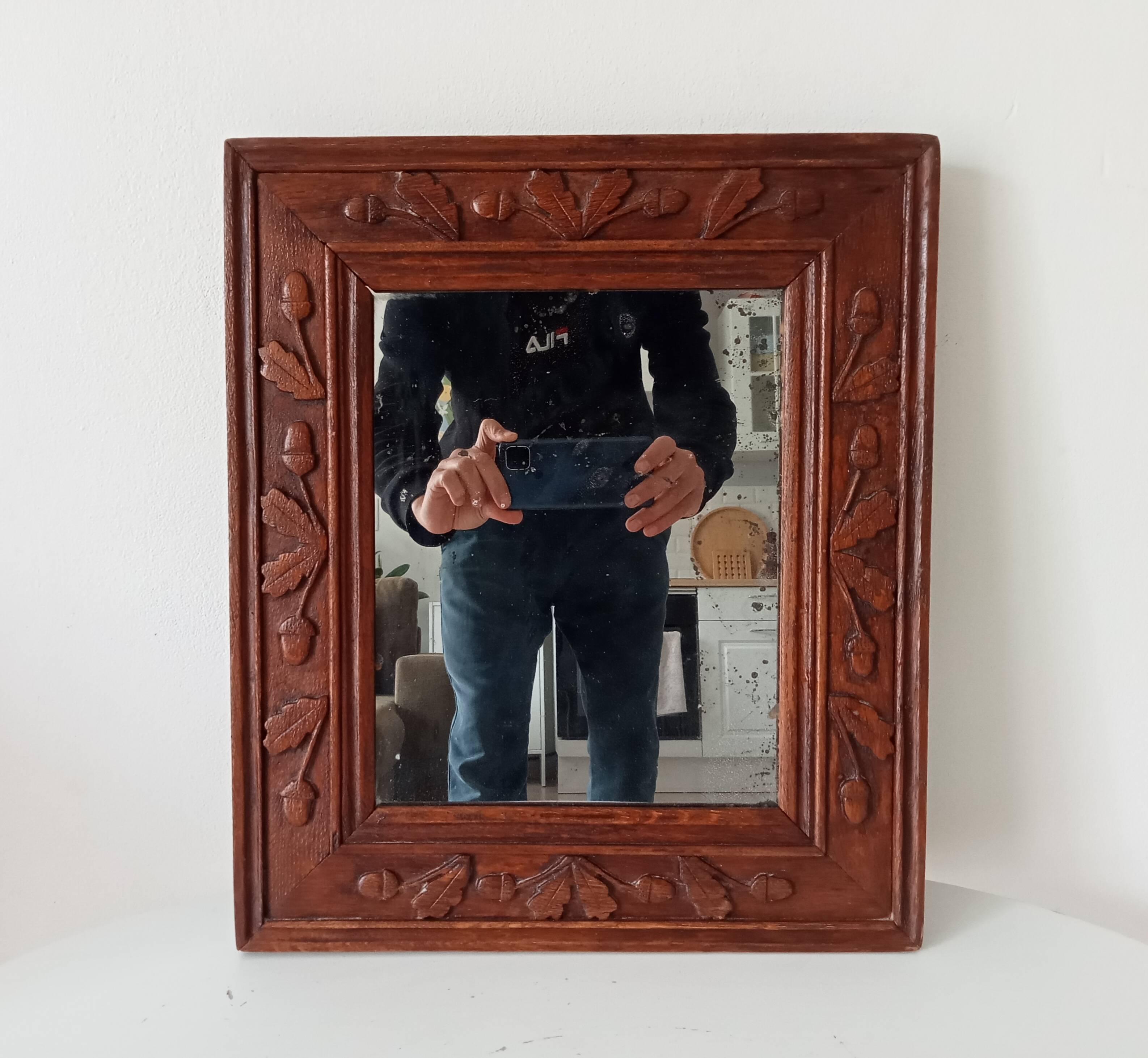 Antique mirror in carved wood