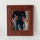 Antique mirror in carved wood