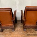 PAIR OF BRUTALIST ARMCHAIRS IN TEAK AND VINTAGE COGNAC LEATHER FROM THE 1950S