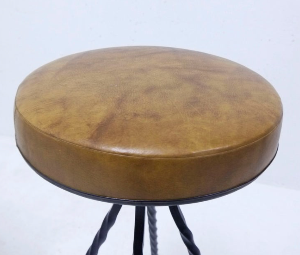 Footswith e.g. wrought iron feet and 60s vinyl seating