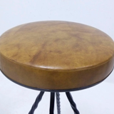 Footswith e.g. wrought iron feet and 60s vinyl seating