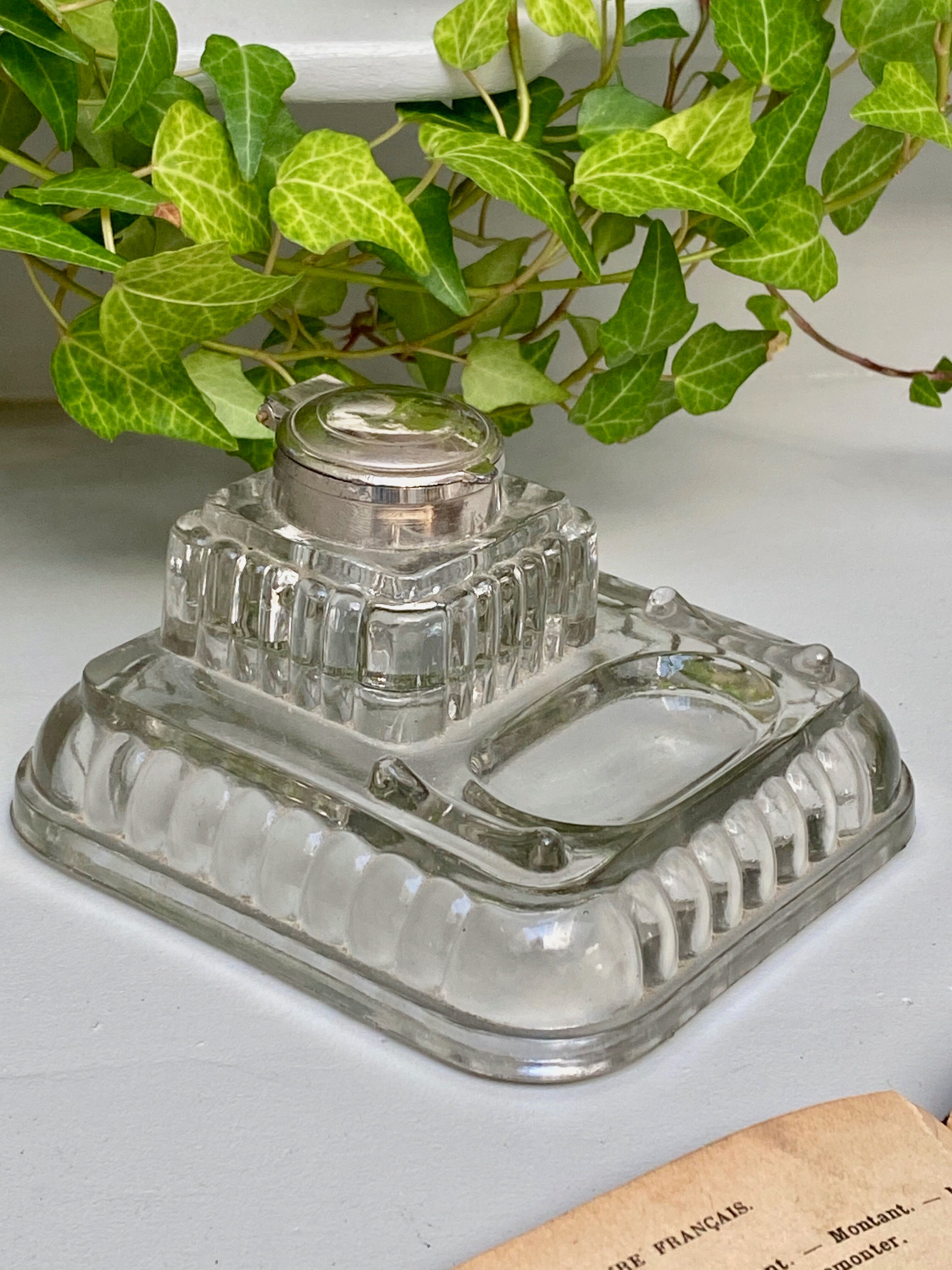 Old glass inkwell