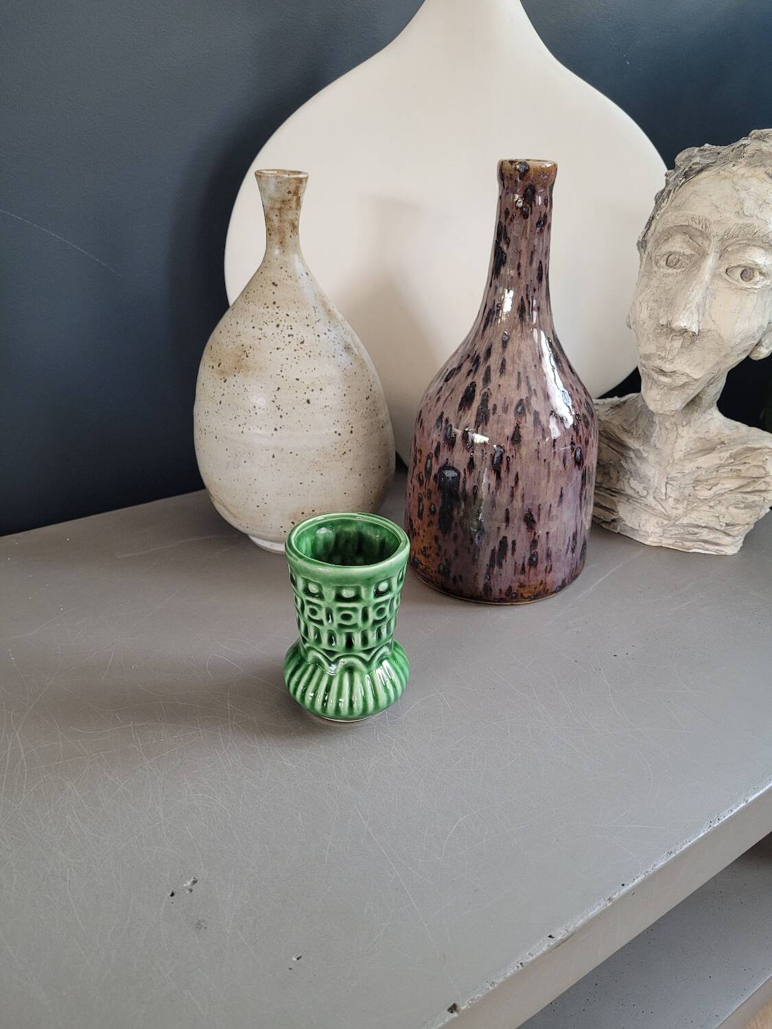 Small vintage green patterned vase