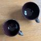 Ceramic coffee cups human nose and mouth