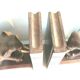 Art Deco bookends wooden elephants and bones on wooden terrace, book shape