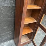 Old narrow wooden showcase.